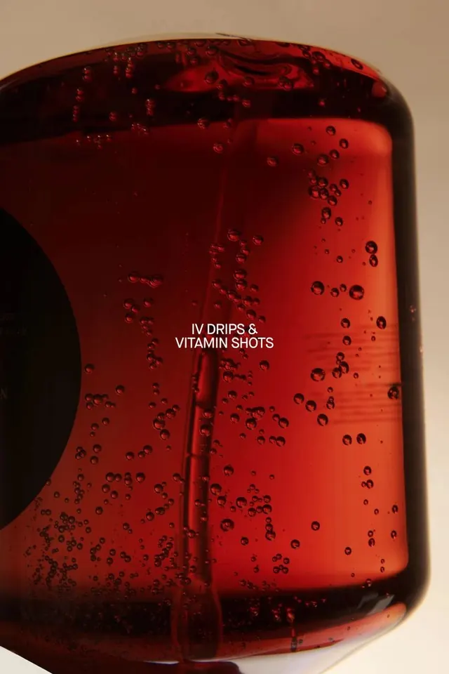 Red Vitamin Supplement Bottle