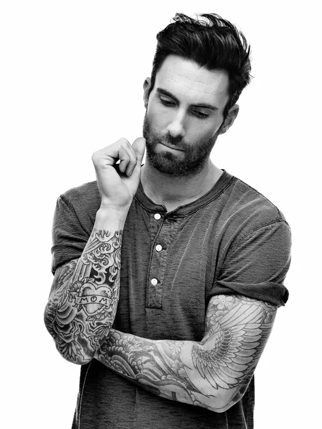 Black and White Portrait of Man with Tattoos