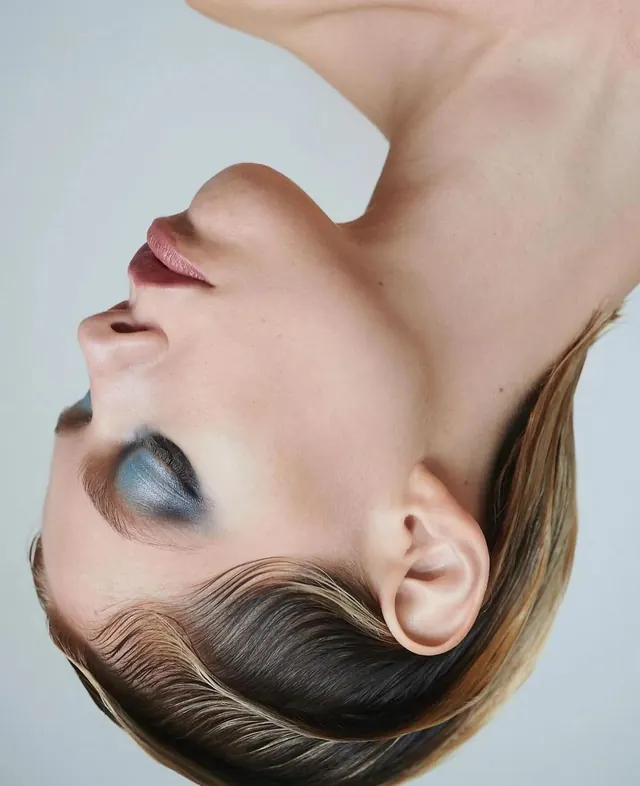 Beauty portrait with blue eyeshadow, minimal, editorial, light