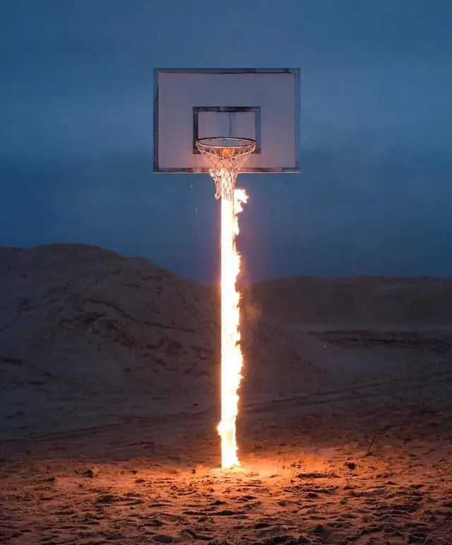 Flaming Basketball Hoop in Desert