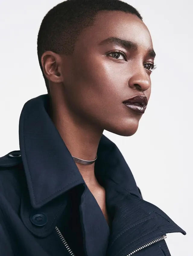 Portrait of a Person in Dark Outerwear