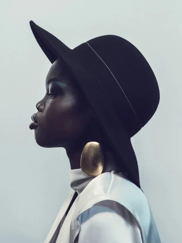 Profile of a Woman in a Wide-Brimmed Hat