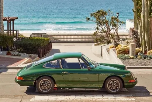 Green Sedan on Beach