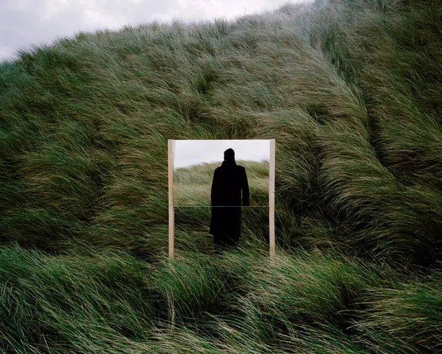 Figure in Tall Grass