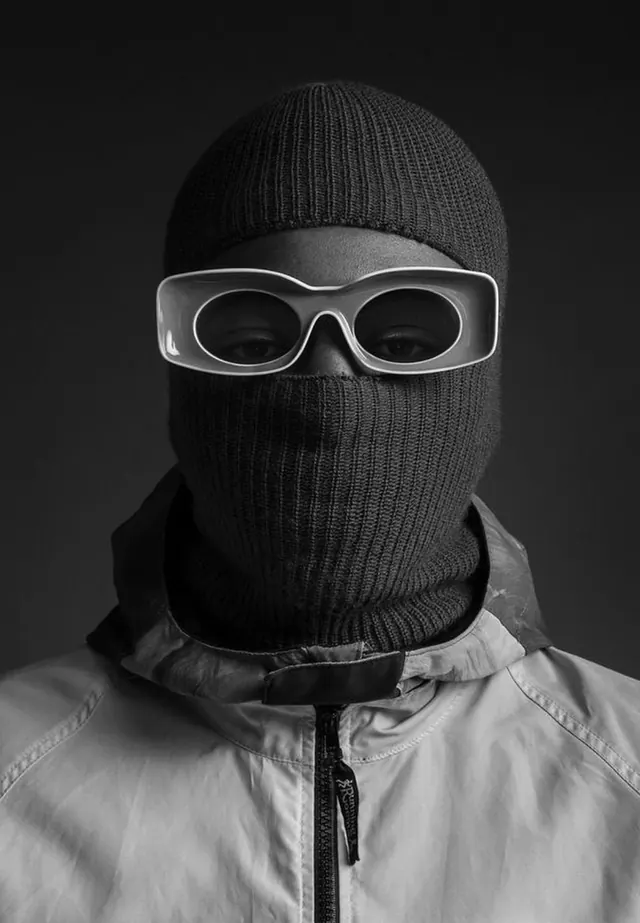 Fashion portrait in balaclava and white sunglasses, minimal, monochrome, monochrome