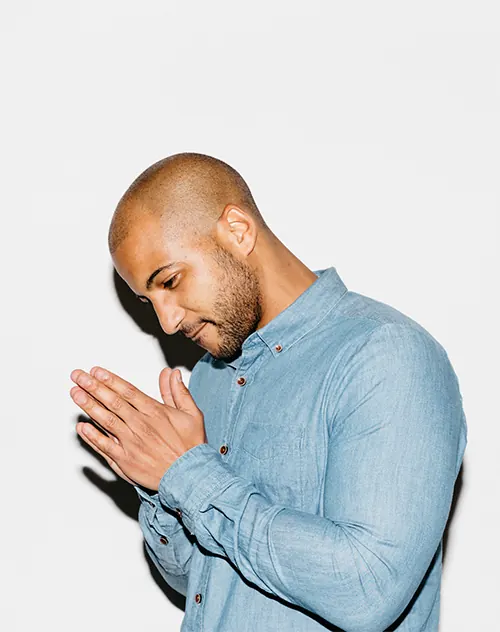 Portrait with clasped hands gesture, photographic, minimal, light