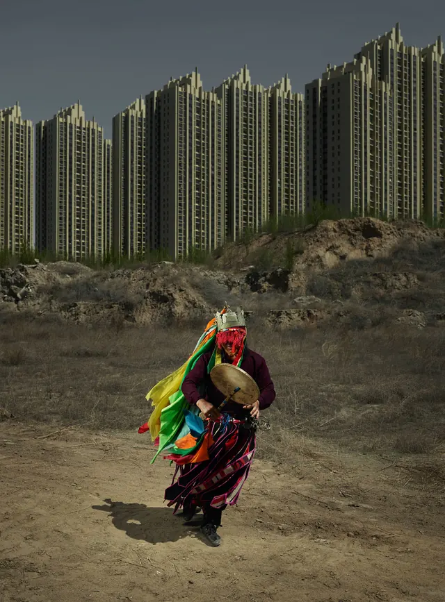Person in Colorful Attire in Desert Landscape
