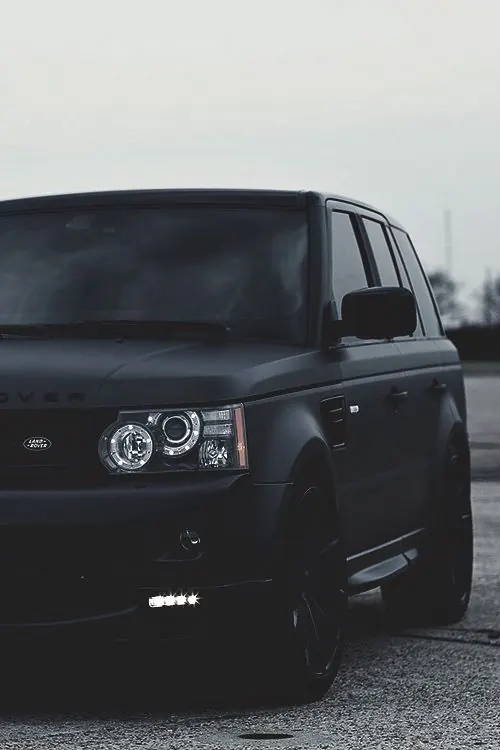 Matte black Range Rover front, minimal, dark