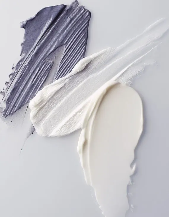 Purple and white cream texture swatches, minimal, photographic, light