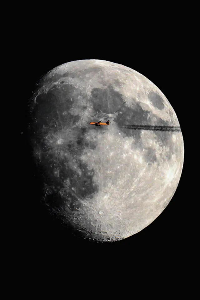 Moon and Spacecraft Silhouette