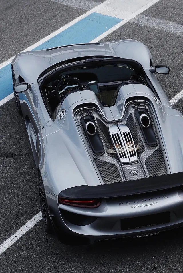 Silver Sports Car on Track