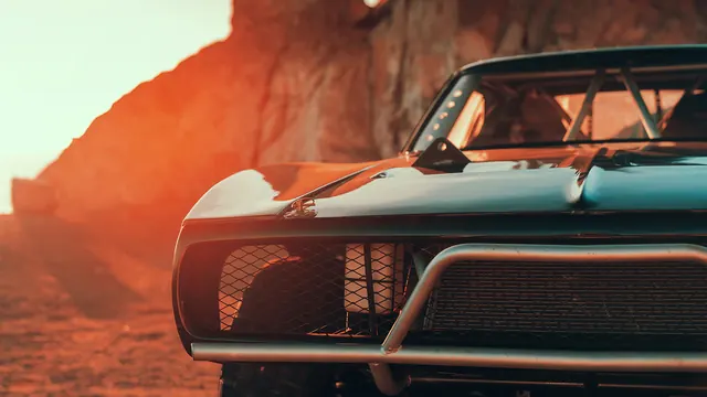 Vintage Car in Desert Landscape