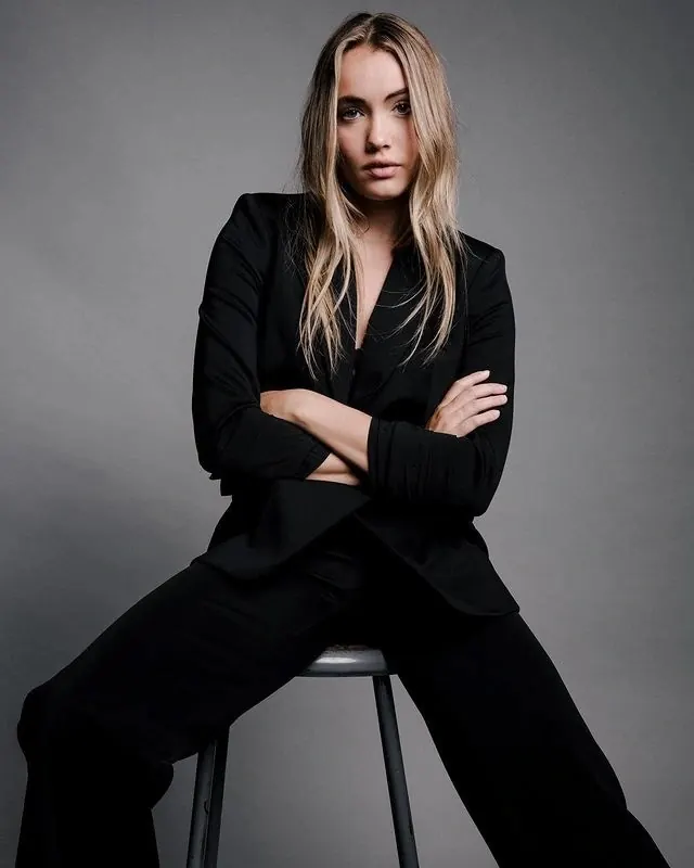 Portrait of a woman in black attire