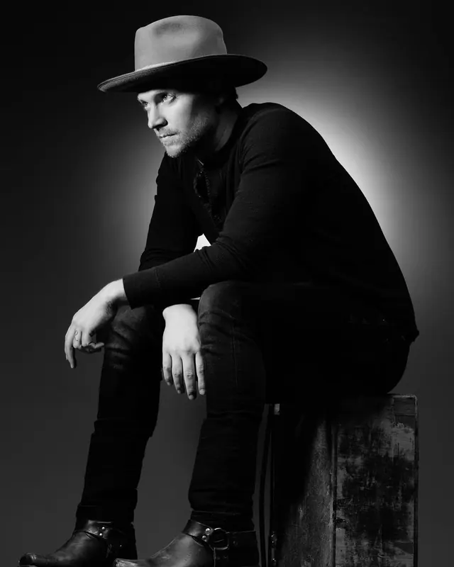 Monochrome Portrait of Man in Hat