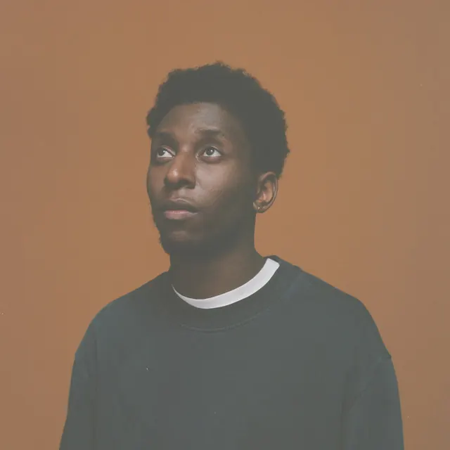 Portrait of a man in a dark sweater