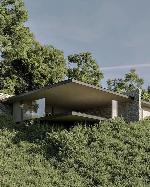 Modern hillside concrete house, minimal, photographic, light