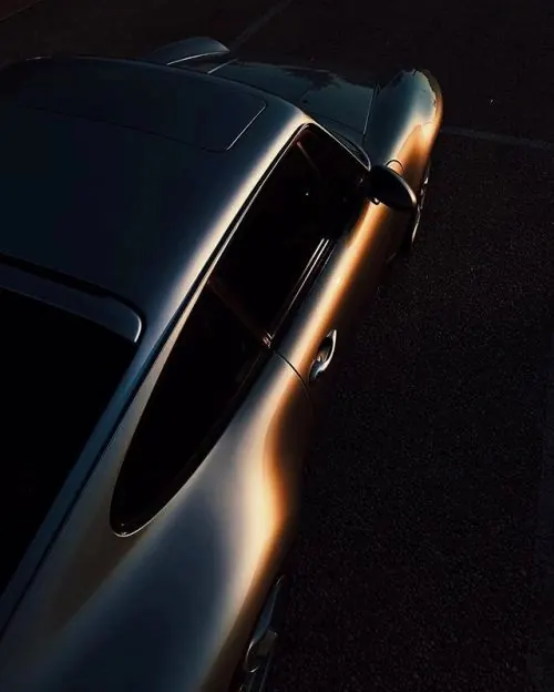 Car Silhouette with Golden Hour Reflection