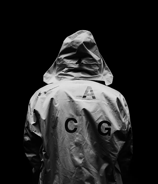 Hooded Figure with CG Branding