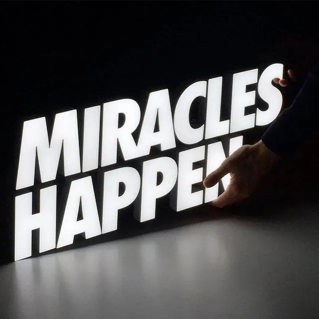 Miracles Happen Signage
