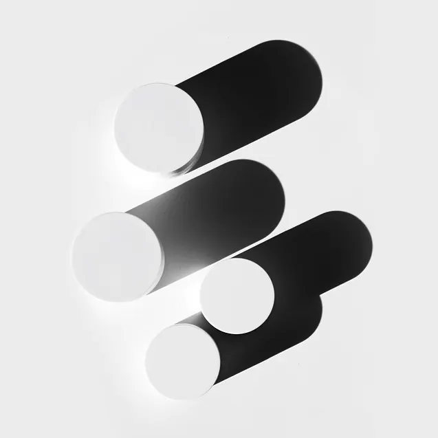 Minimal wall lights with staggered white discs on black backplates, minimal, light-mode, light