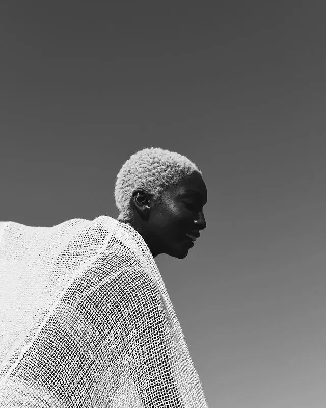 Monochrome Portrait of a Person in Textured Fabric