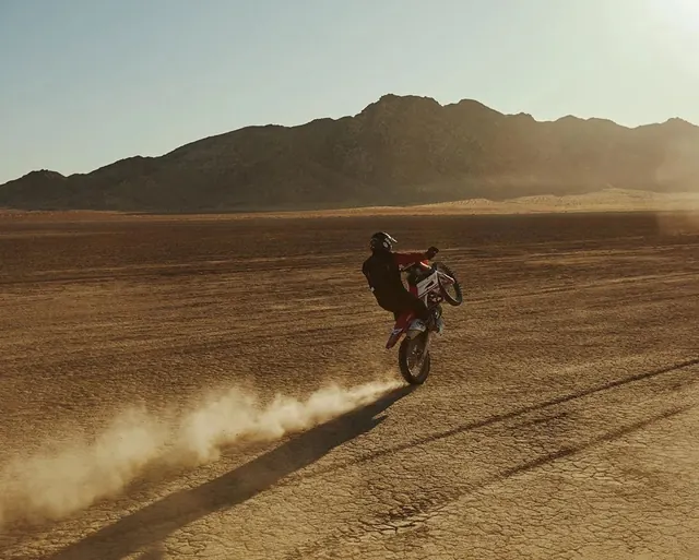 Motorcyclist in Desert Landscape
