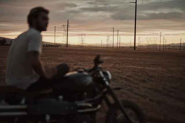 Motorcycle Rider at Sunset