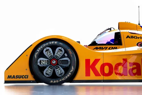 Yellow Racing Car with Koda Branding