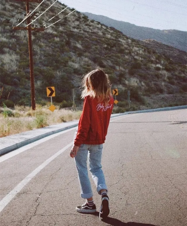 Person in Red Sweater on Road
