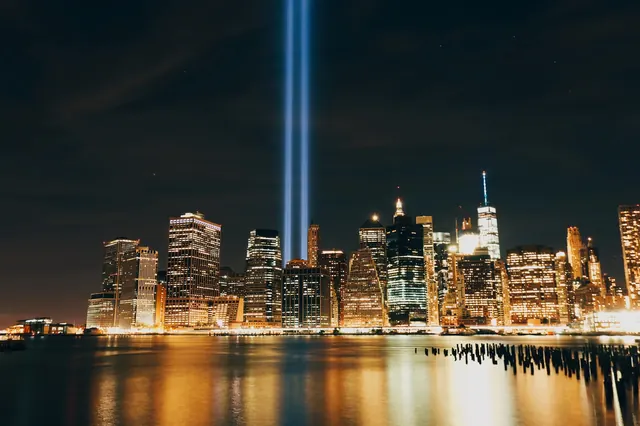Night Cityscape with Light Beam