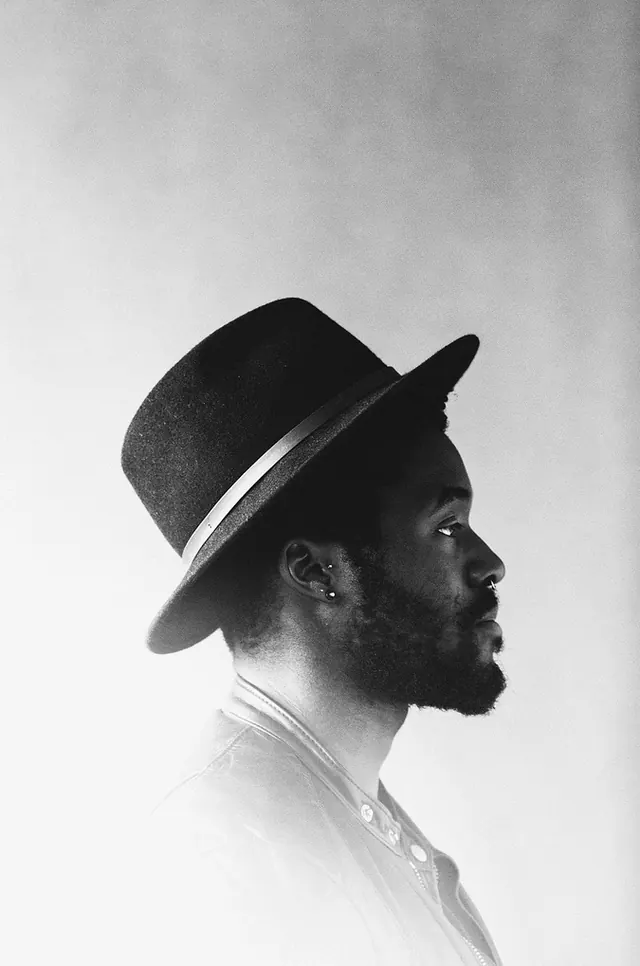Black and White Portrait of a Man in a Hat