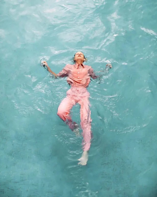 Person Floating in Water