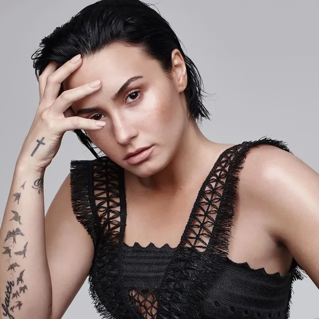 Portrait of a woman with tattoos