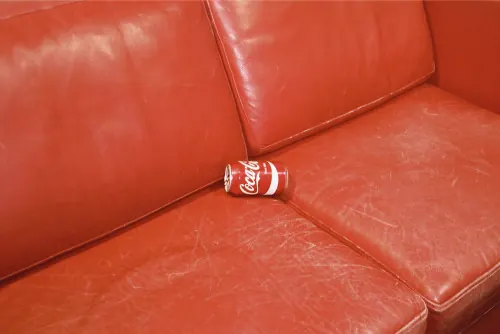 Red Leather Sofa with Small Object