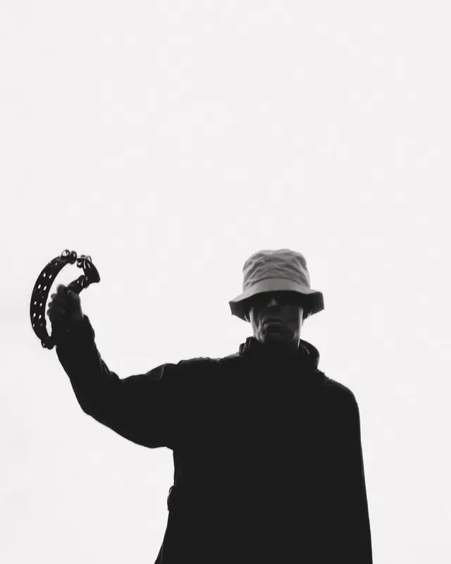 Silhouette portrait with tambourine, photographic, monochrome, monochrome