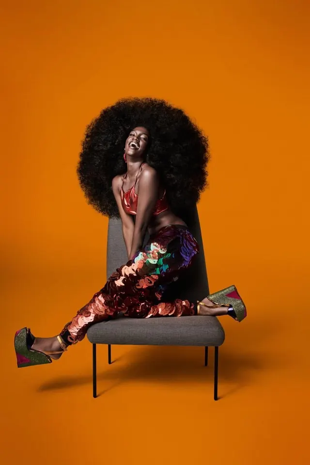 Orange studio fashion portrait, photographic, retro, warm