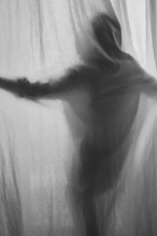 Charcoal figure movement study, photographic, editorial, monochrome