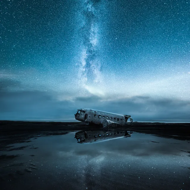 Train in Starry Night Landscape