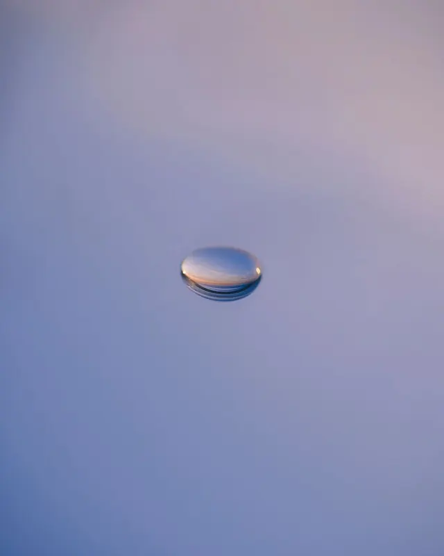 Water droplet macro reflection, minimal, photographic, cool