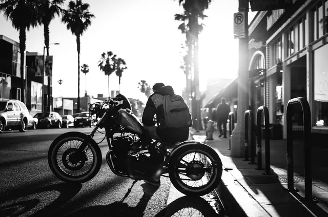 Motorcycle golden hour street photo, photographic, monochrome, monochrome