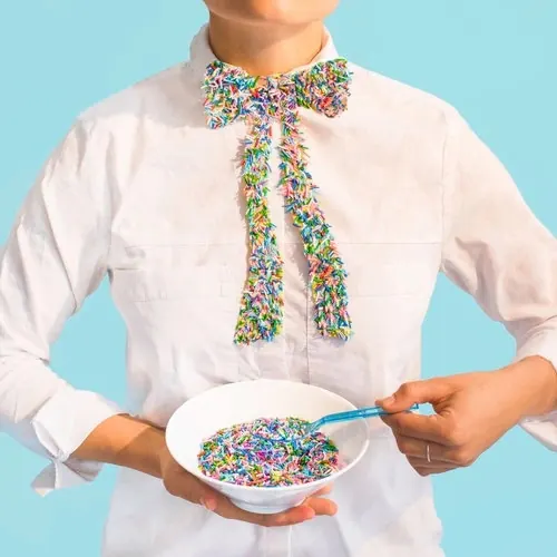 Sprinkle bow tie conceptual photo, playful, photographic, vibrant