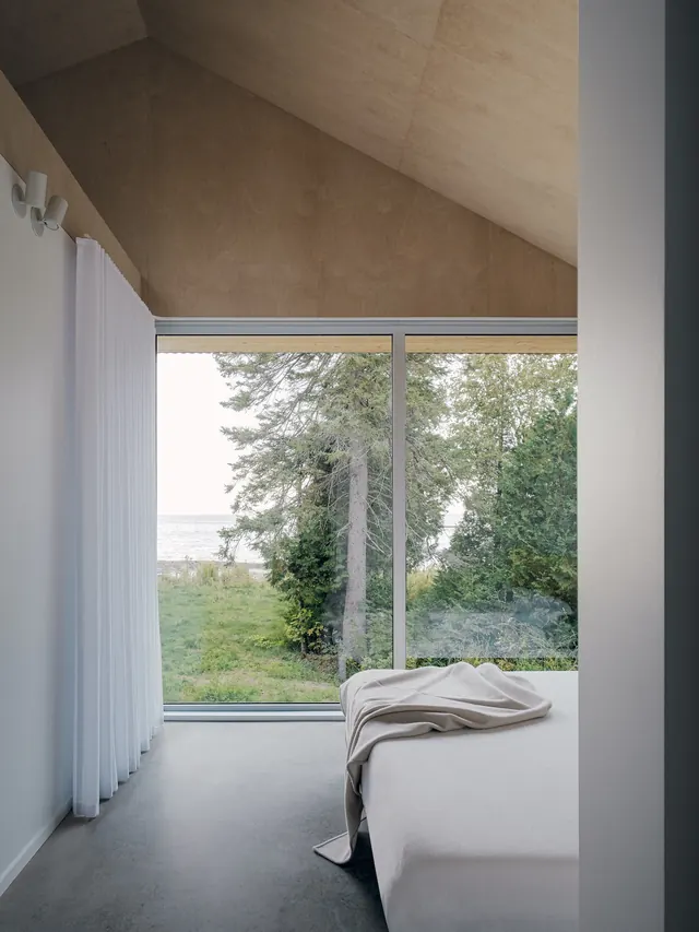 Minimal cabin bedroom with forest view, minimal, photographic, light