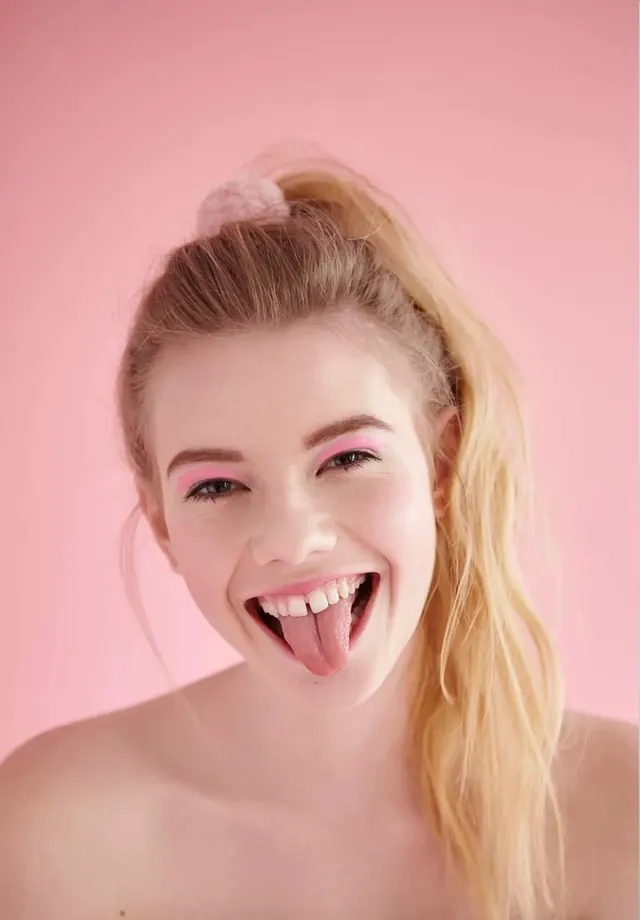 Monochrome pink beauty portrait, photographic, playful, pastel