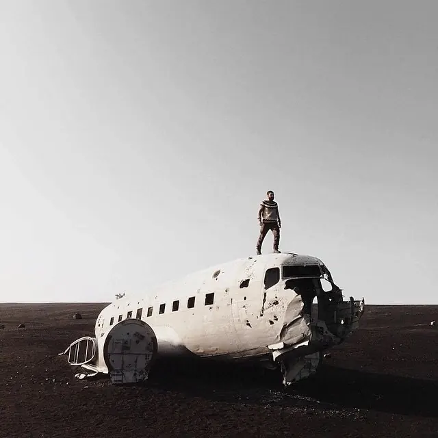 Lone Figure on Desert Plane