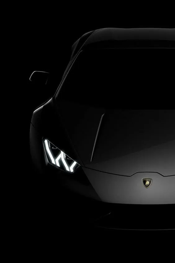 Low-key Lamborghini front detail, luxury, photographic, dark