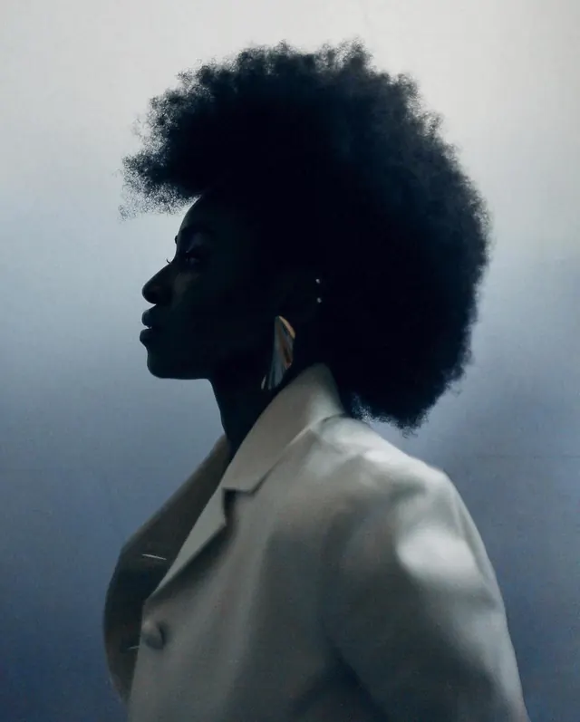 Backlit profile fashion portrait, editorial, photographic, cool