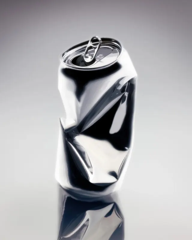 Crushed aluminum can still life, minimal, photographic, light