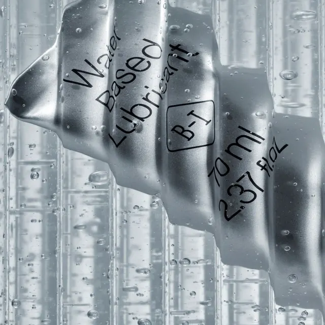 Metallic tube submerged in bubbly gel, minimal, technical, cool
