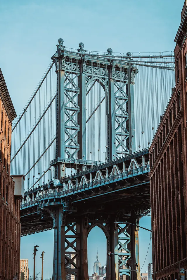 Manhattan Bridge framed by DUMBO bricks, photographic, geometric, cool
