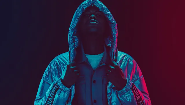 Neon-Lit Portrait in Hoodie
